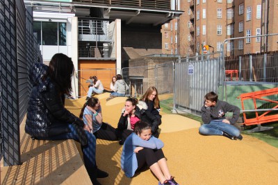 Students sit bored in the new playground. The current version of the new playground is not an improvement on the previous one. Photo by Bella Worrell 