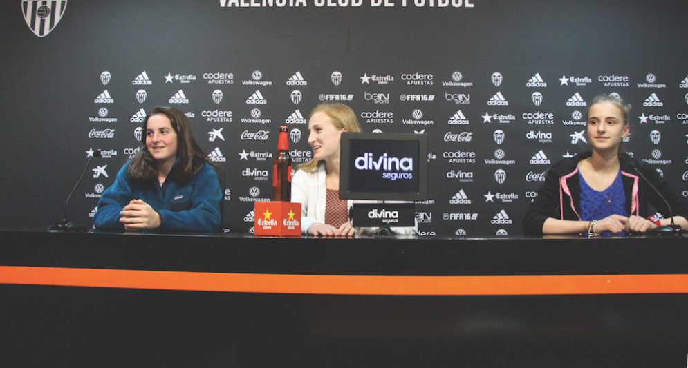 At the Valencia Club Football Stadium, students were given a tour of the stadium as well as tours of the changing rooms and press areas. Eighth graders Anna Kopfler, Katie Stone, and Natalie Vann sit at the press table (photo by Bella Worrell). 