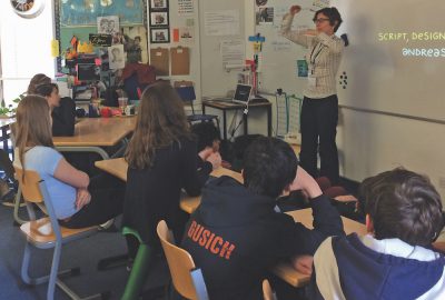 Ms. Brenda Conlan talks to eighth-grade students about drugs in small groups, either during health or flex classes. She went around to each health class or flex class and talked to students about the lows of drugs and alcohol (photo by Jonathan Novak).