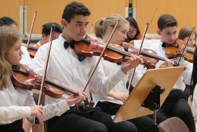 Former ASL eighth grader Jay Ramaswamy plays alongside eighth graders Sofi Janssen and Gabe Hajjar in Salzburg for the AMIS music festival (photo from http://amis-online.org).