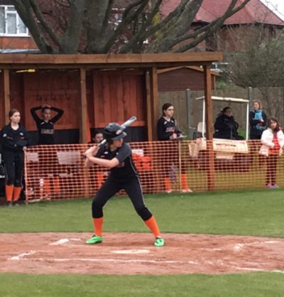 Eighth-grader Jessica Woodhams prepares to swing at a pitch against Cobham. Woodhams hit a home run, and by the end of this inning the Eagles had 7 runs. This game took place on April 18 at Canons Park and the final score was 38-10 (photo courtesy of the Woodhams Family).
