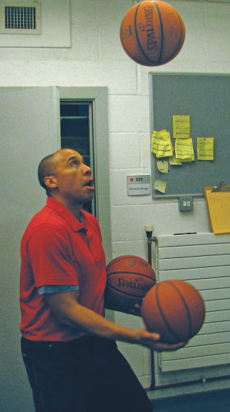 As well as being a PE teacher, Mr. Harris also has a talent of being able to juggle many different objects (Scroll archive photo). 